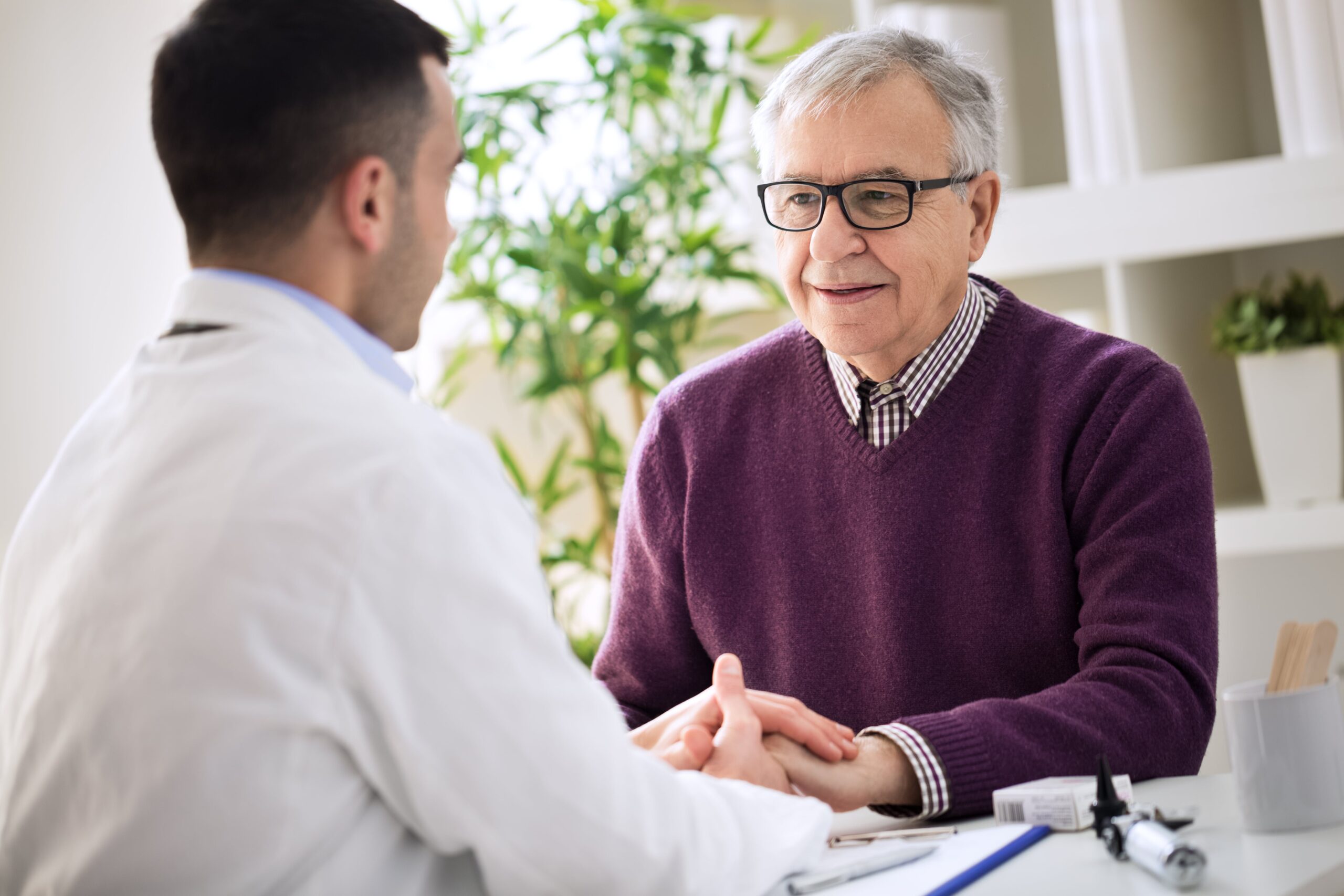 urologist speaking with a man about bph.
